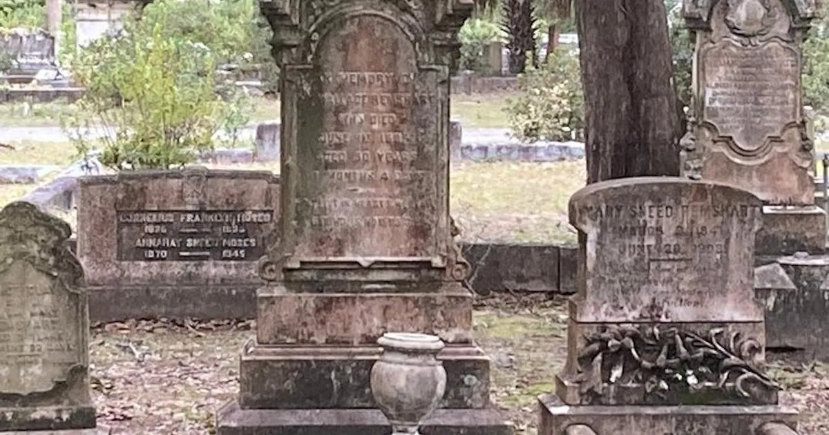 Ornate graves and headstones in Bonaventure Cemetery seen on a daytime cemetery tour linked to ghost tours in Savannah GA