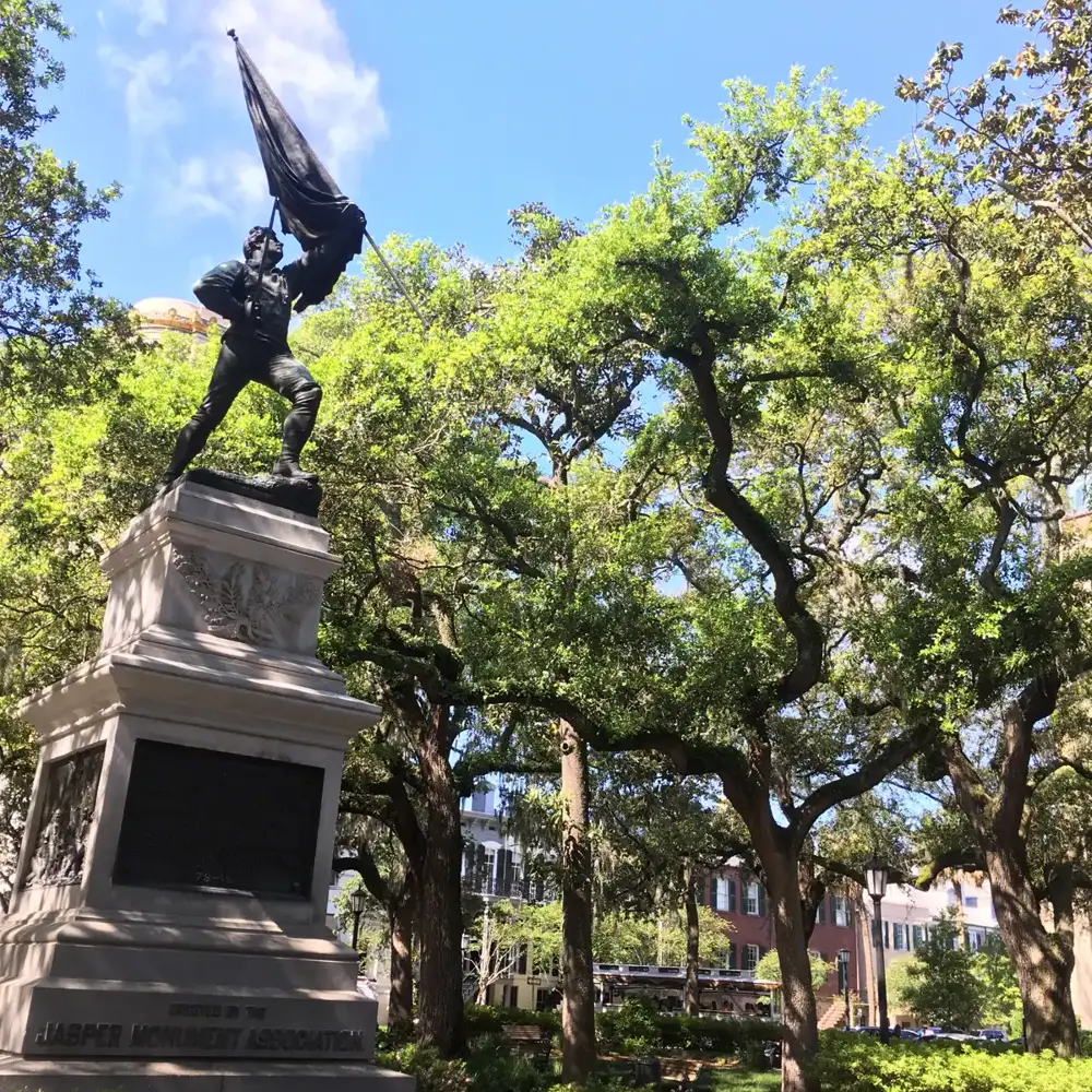 The William Jasper monument in Madison Square, where the haunted pub crawl ghost tour in Savannah GA meets